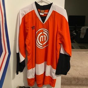Orange men’s medium hockey jersey